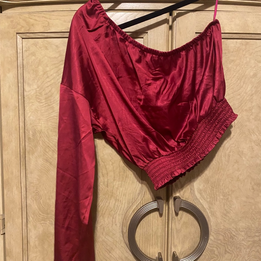 Wine colored one shoulder shirt. So cute!!!
